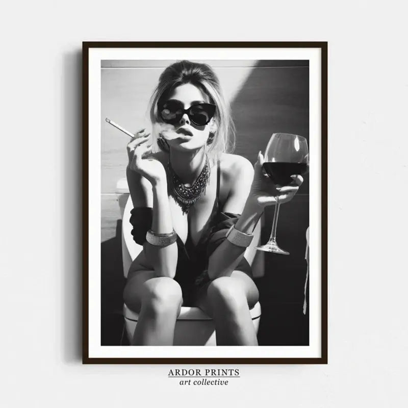 Black and white art print of woman with wine glass and cigarette, stylish home decor