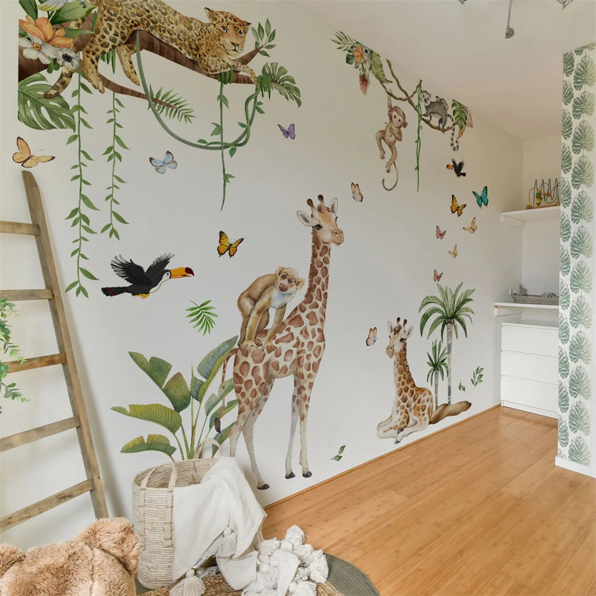 Woodland Animal Wall Decals for Kids featuring giraffes, monkeys, and tropical elements in a nursery setting.